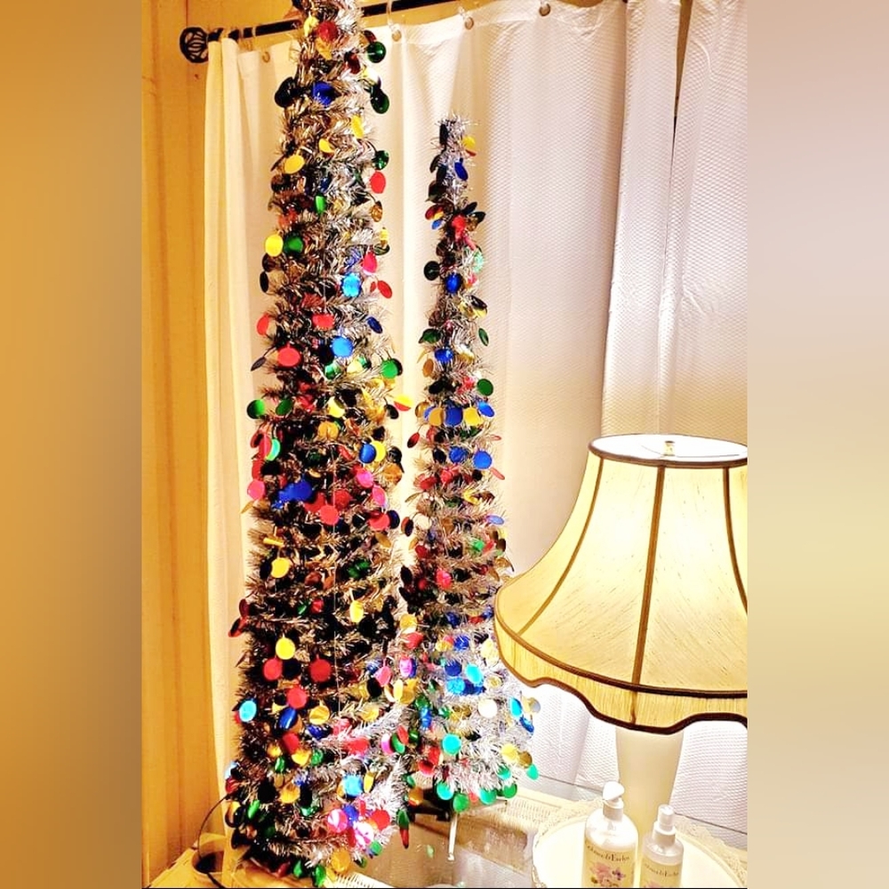 MCM vintage pair of mylar christmas trees 5ft and 4 feet tall